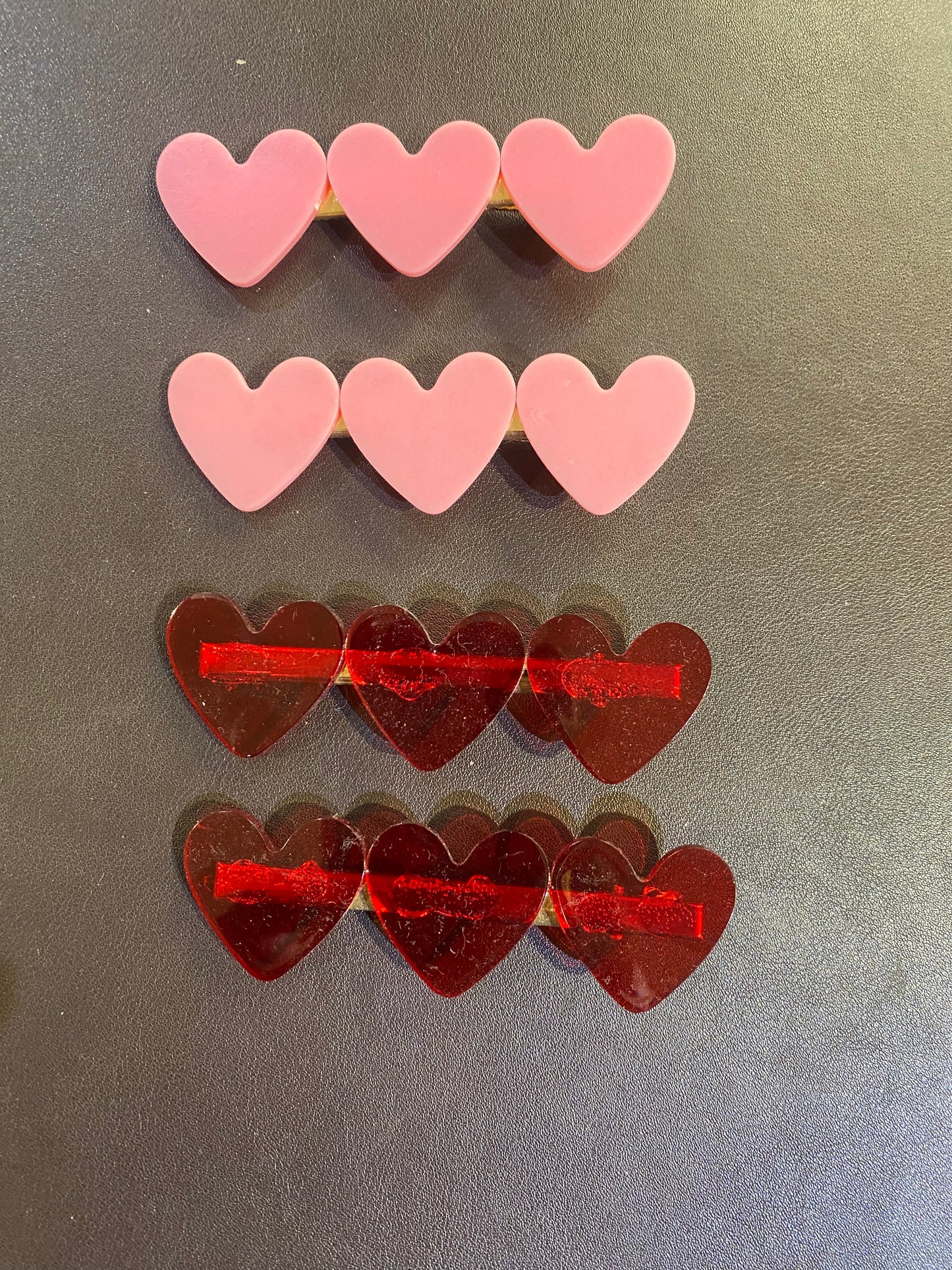 MOLLETTE DI PLASTICA CON CUORI